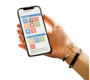 hand holding a smart phone with the Prodigy app. hand holding a smart phone with the Prodigy app.